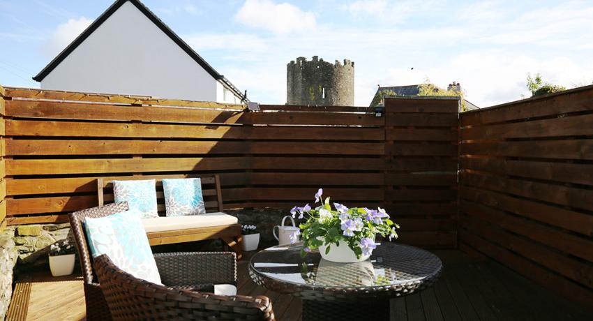 kirrin cottage decked patio with turret view